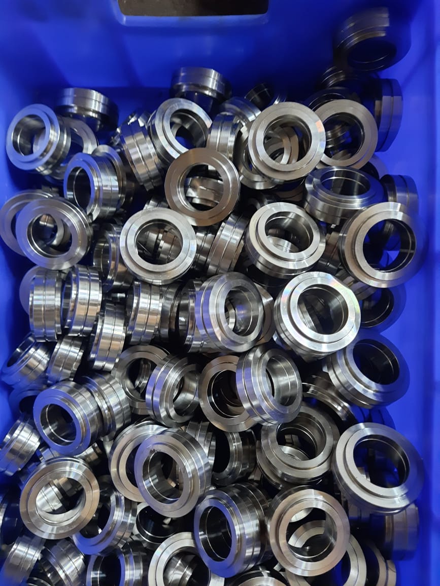 Volume production of turned collar spacers
